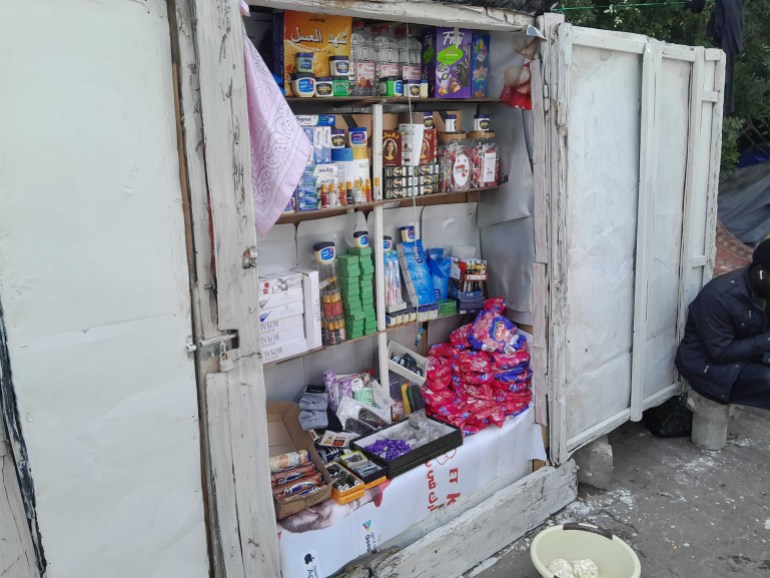 A small shop opened in a cupboard in the passage that serves as the refugees' camp outside the IOM, Tunis
