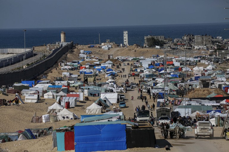 A displacement camp in Rafah. [Abdelhakim Abu Riash/Al Jazeera]