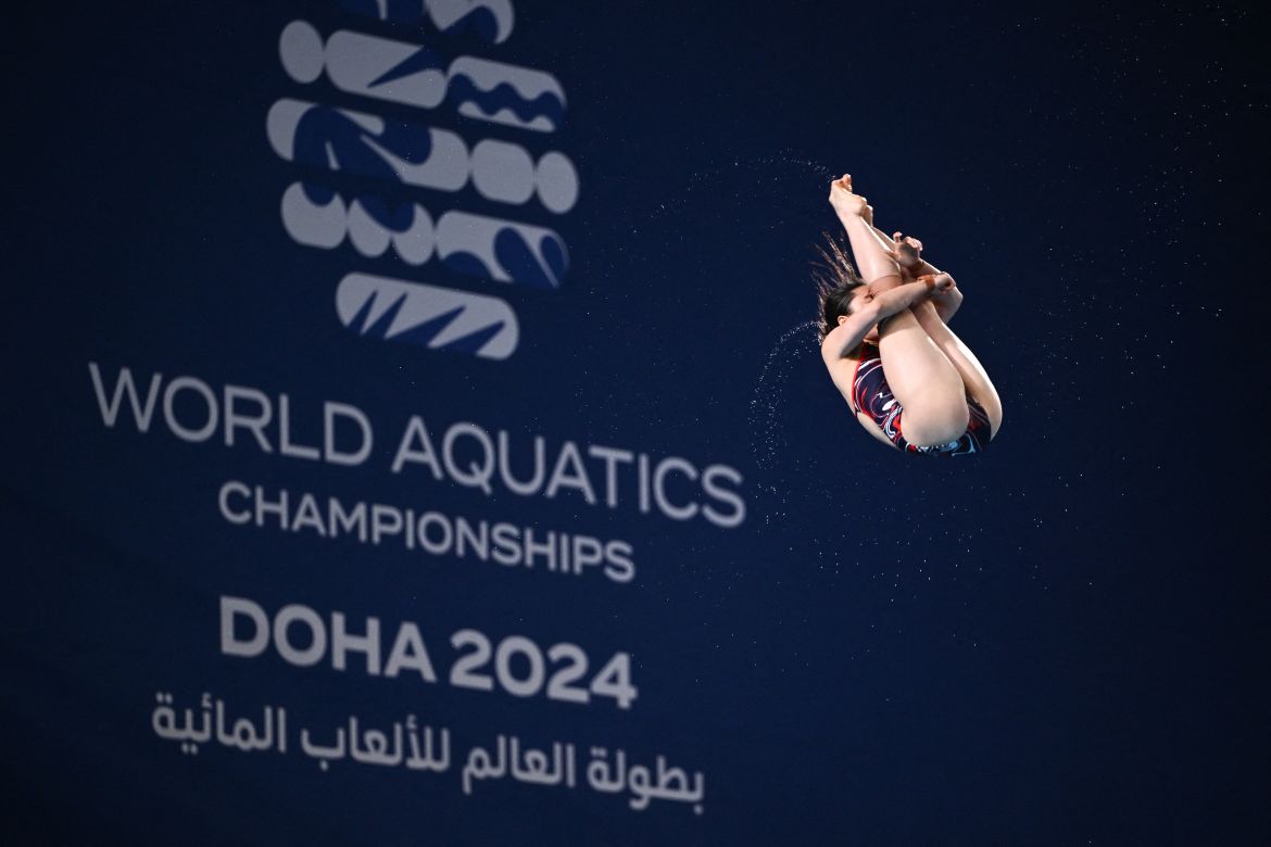 Japan's Rin Kaneto competes in the preliminary round of the women's 10m platform diving event during the 2024 World Aquatics Championships at Hamad Aquatics Centre in Doha on February 4