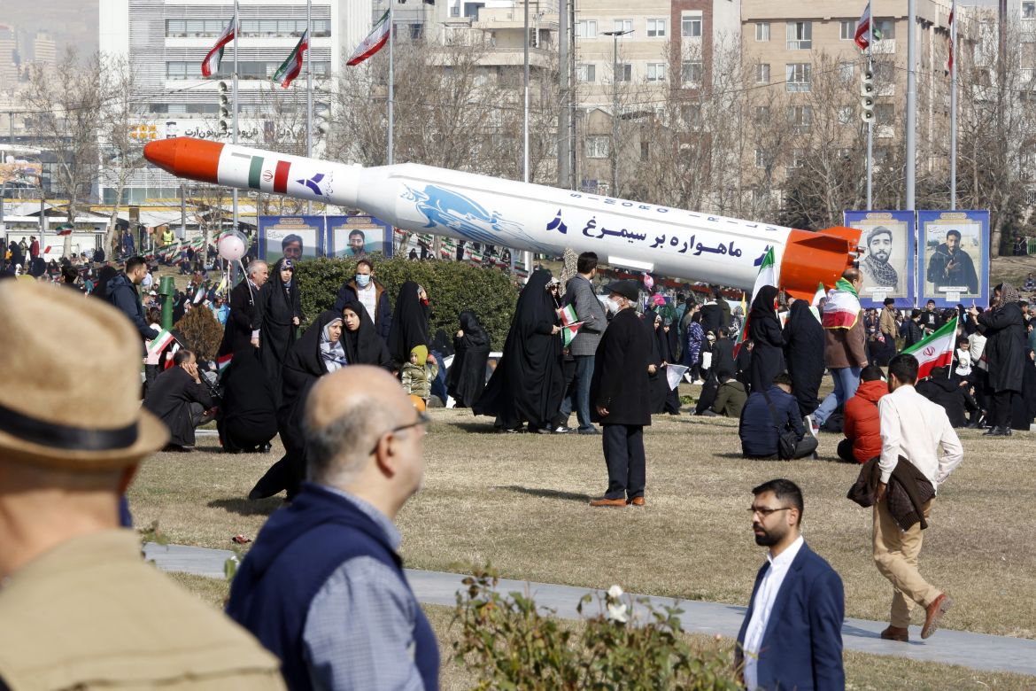 Iran's two-stage Simorgh (Phoenix) satellite carrier is displayed in Tehran as people gather to mark the 45th anniversary of the Islamic revolution on February 11