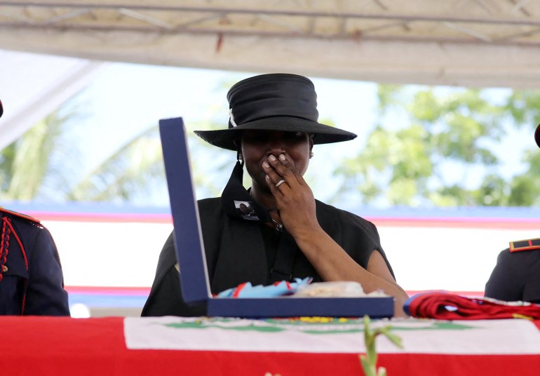 Martine Moïse grieves during the funeral for her husband, slain Haitian President Jovenel Moïse, on July 23, 2021, in Cap-Haitien, Haiti