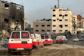 This handout photograph by the WHO shows a convoy of ambulances during a mission to evacuate patients from Nasser Hospital in Khan Younis on February 18, 2024 [Christopher Black/ WHO via AFP]