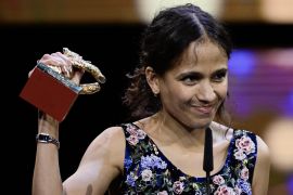 French-Senegalese filmmaker Mati Diop celebrates in Berlin with the Golden Bear for Best Film awarded for the documentary, Dahomey [John Macdougall/AFP]