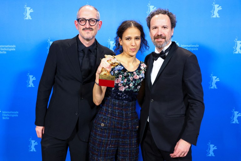 French-Senegalese filmmaker and actress Mati Diop celebrates with the Golden Bear for Best Film for the film 