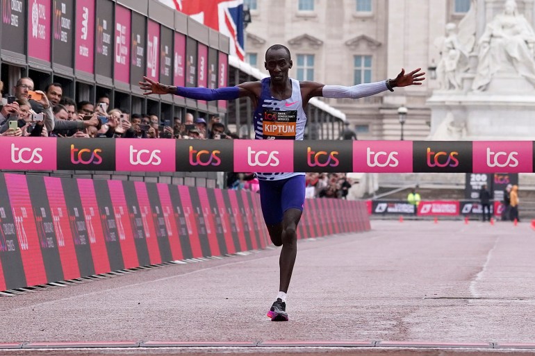 Kenya's Kelvin Kiptum crosses the finish line to win the men's race at the London Marathon in London, Sunday, April 23, 2023. (AP Photo/Alberto Pezzali)