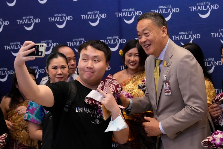 Chinese tourists taking selfies with Thai PM Srettha Thavisin