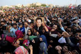 Supporters of Pakistan Tehreek-e-Insaf hold a rally