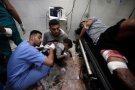 Palestinians wounded in the Israeli bombardment receive treatment at the Nasser hospital in Khan Younis, Jan. 22, 2024. [Mohammed Dahman/AP] (AP Photo)