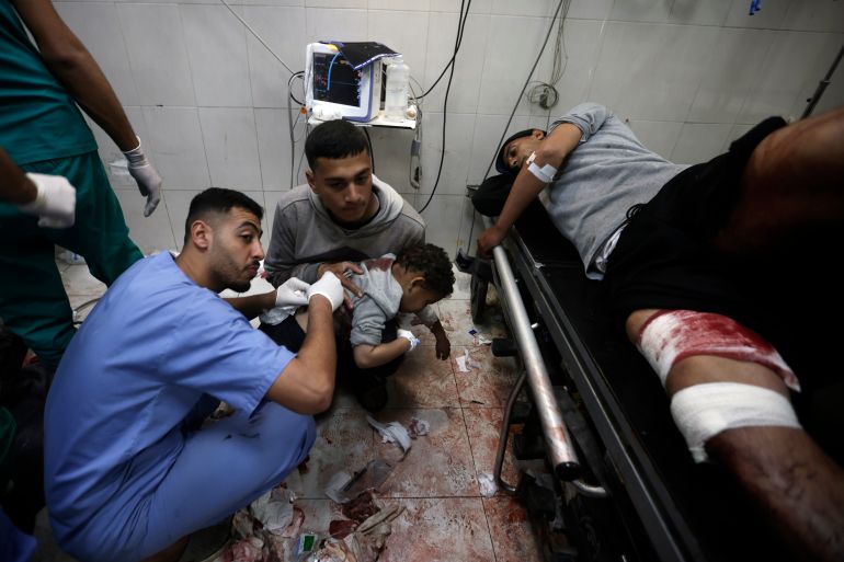 Palestinians wounded in the Israeli bombardment of the Gaza Strip receive treatment at the Nasser hospital in Khan Younis