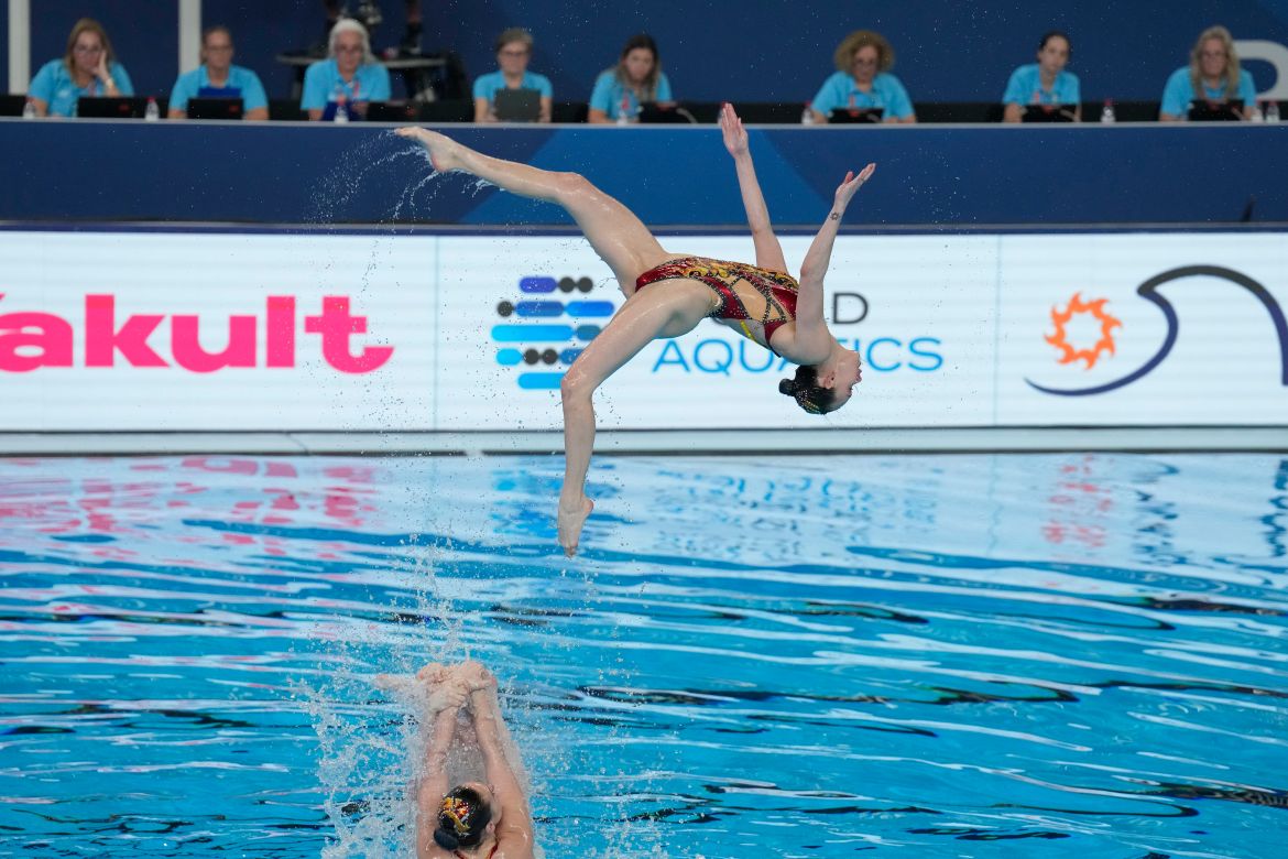 Canada team compete in the mixed team acrobatic final of artistic swimming at the World Aquatics Championships in Doha, Qatar, Sunday, Feb. 4