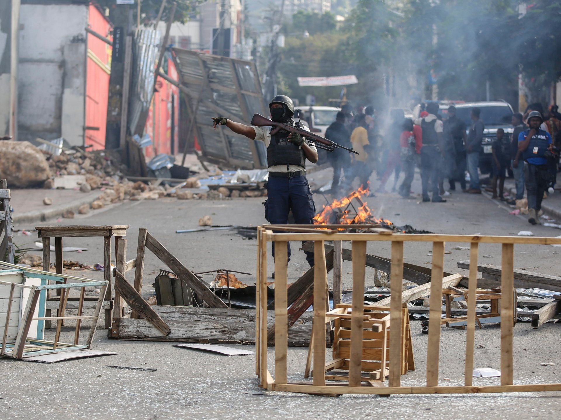 Gunfire paralyses Haiti as gang leader pushes for PM’s removal | News