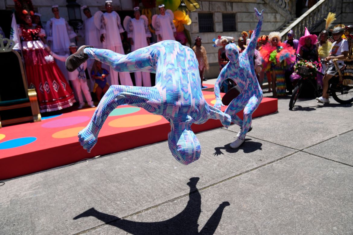 Performers dance prior a ceremony that marks the official start of Carnival in Rio de Janeiro, Brazil, Friday