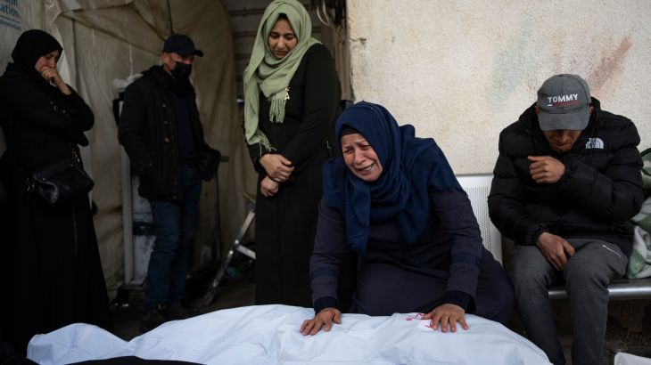 Palestinians mourn relatives killed in the Israeli bombardment in Rafah, Gaza Strip.