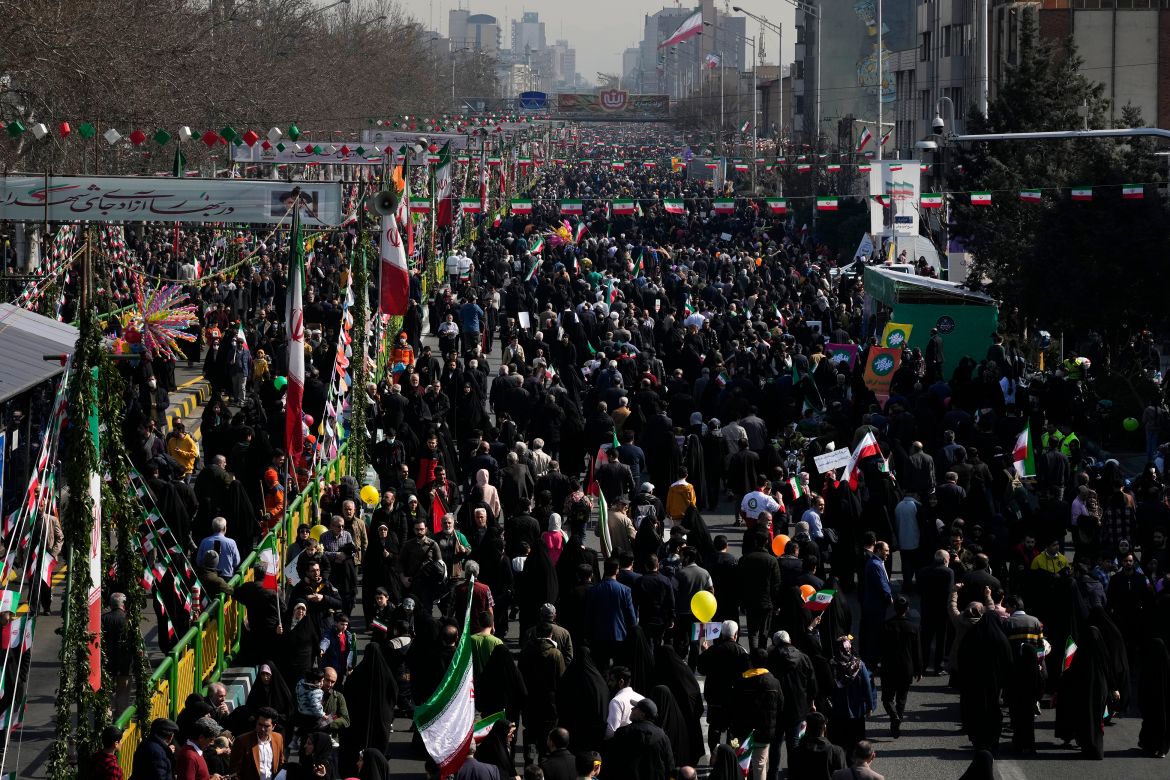 Iranians attend the annual rally commemorating their 1979 Islamic Revolution at the Azadi (Freedom) St. in Tehran