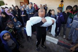 A Palestinian morns a relative killed in the Israeli bombing of the Gaza Strip in Deir al Balah, Gaza Strip [Adel Hana/AP Photo]