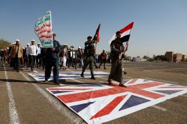Newly recruited Houthi fighters attend a protest march against the U.S.-led strikes on Yemen and the Israeli war in the Gaza Strip, Wednesday, Feb. 21, 2024, in Sanaa, Yemen. (AP Photo/Osamah Abdulrahman)