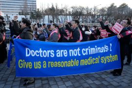 Doctors in South Korea stage a rally against the government&#039;s medical policy near the presidential office in Seoul, South Korea, February 25, 2024 [Ahn Young-joon/AP]