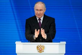 Russian President Vladimir Putin delivers his state of the nation address in Moscow, Russia [Alexander Zemlianichenko/AP Photo]