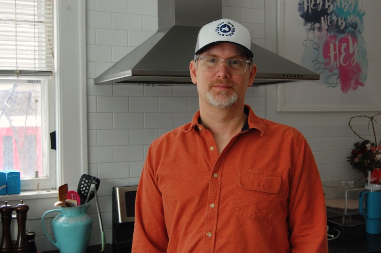 Rich Price stands for a photo in his kitchen in Burlington, Vermont