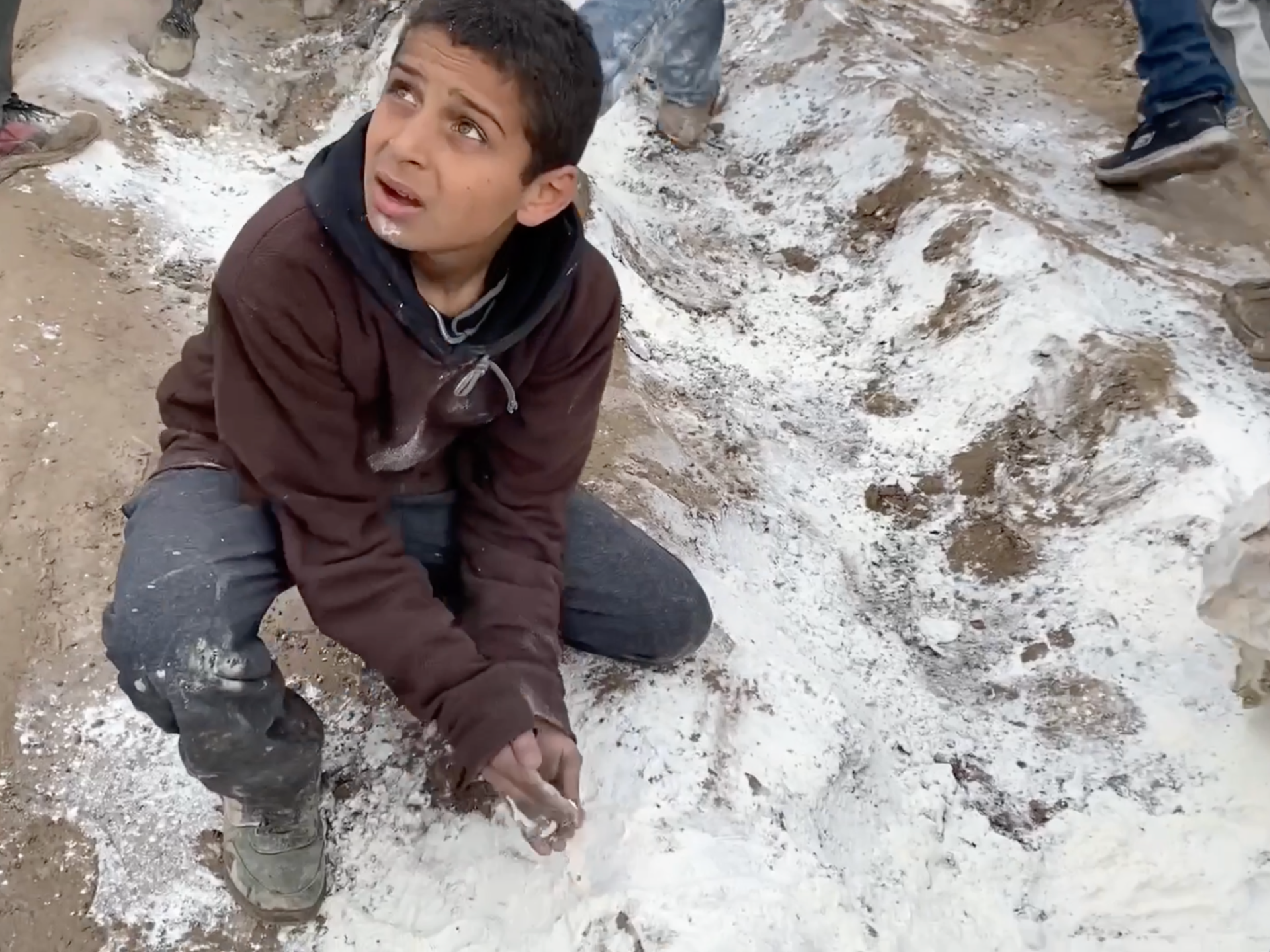 Children collect spilled flour from the ground after Gaza aid chaos | Israel War on Gaza