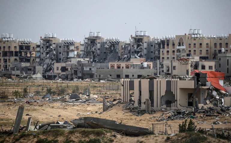 A view of destroyed buildings following Israeli air strikes and a military operation in Khan Younis, southern Gaza Strip