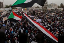 Thousands of protesters wave Sudanese flags in Khartoum, April 2019
