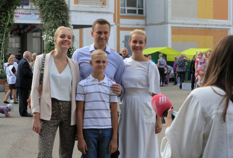 Russian opposition leader Alexei Navalny, his wife Yulia, daughter Daria and son Zakhar pose for a picture outside a polling station during the Moscow city parliament election in Moscow, Russia September 8, 2019. REUTERS/Tatyana Makeyeva
