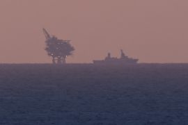 An Israeli gas platform is seen as an Israeli navy vessel patrols in the Mediterranean off the coast of Ashkelon on November 14, 2023 [File: Reuters/Amir Cohen]