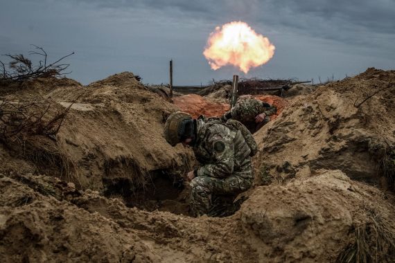 Ukrainian service members from a first presidential brigade Bureviy (Hurricane) of the National Guard of Ukraine fire a mortar during an exercise, amid Russia's attack on Ukraine, in Kyiv region, Ukraine November 8, 2023