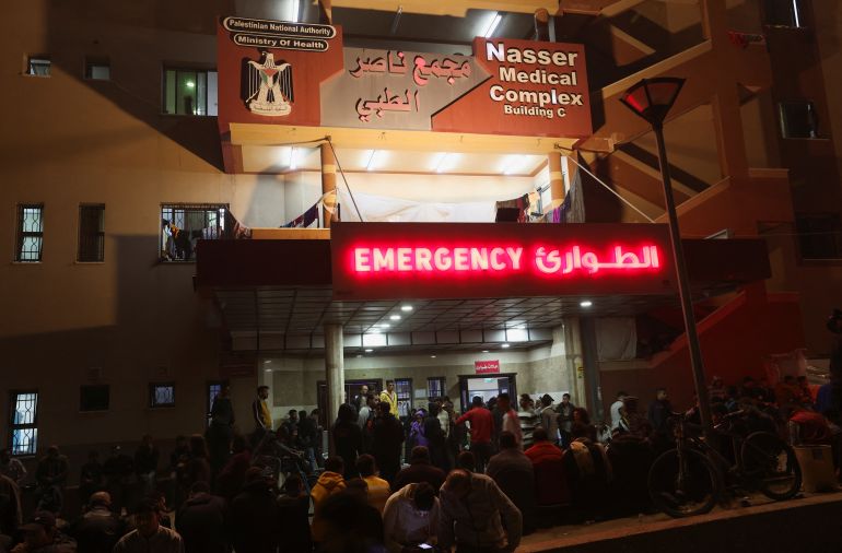 Palestinians gather outside Nasser hospital following Israeli strikes, amid the ongoing conflict between Israel and Palestinian Islamist group Hamas, in Khan Younis, December 12, 2023.