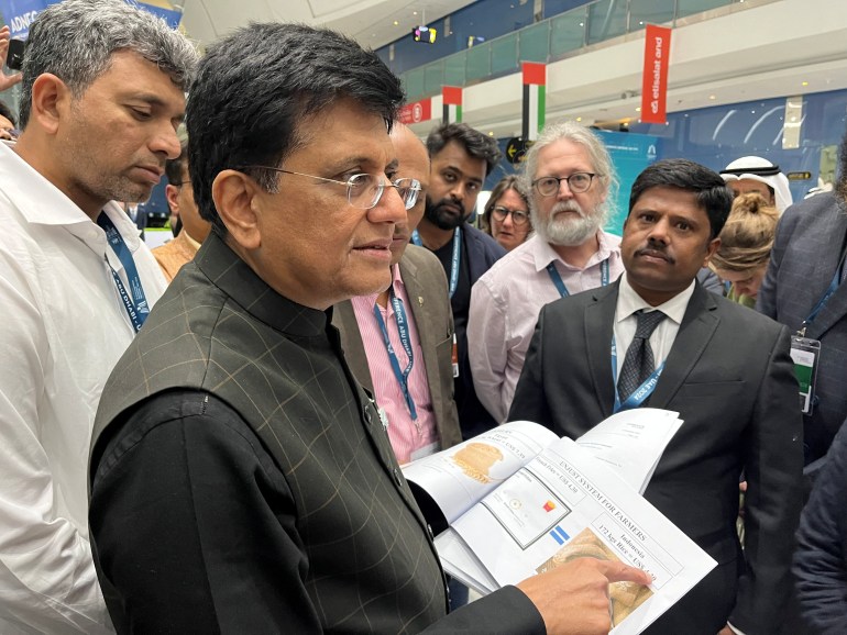 India's commerce minister Piyush Goyal talks to a crowd
