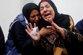 Mourners react during the funeral of Palestinian twins Wesam and Naeem Abu Anza who were killed in Israeli air raids in Rafah in the southern Gaza Strip, March 3, 2024 [Mohammed Salem/Reuters]