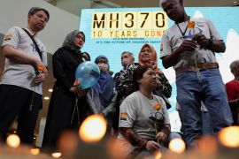 Families of passengers from both China and Malaysia, who were aboard the missing Malaysia Airlines flight MH370, are seen during a remembrance event on March 3, 2024 [Hasnoor Hussain/Reuters]