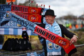 Scarves for sale outside Etihad Stadium before the match [Lee Smith/Action Images via Reuters]