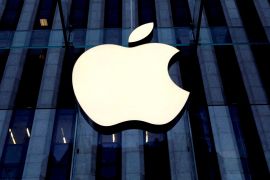 FILE PHOTO: The Apple logo is seen hanging at the entrance to the Apple store on 5th Avenue in Manhattan, New York, U.S., October 16, 2019. REUTERS/Mike Segar/File Photo