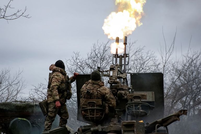 Ukrainian servicemen from air defence unit of the 93rd Mechanized Brigade fire an anti aircraft cannon at a frontline