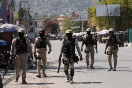 Police patrol in Port-au-Prince, Haiti, after authorities extend a state of emergency [File: Ralph Tedy Erol/Reuters]