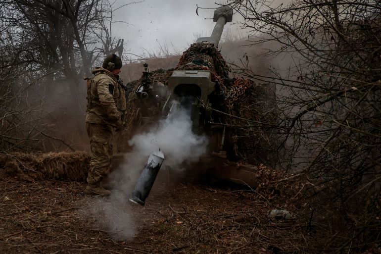 A Ukrainian serviceman of the 126th Separate Territorial Defence Brigade fires a D-30 howitzer towards Russian troops at a position in a front line, amid Russia's attack on Ukraine, in Kherson region, Ukraine March 12, 2024. Radio Free Europe/Radio Liberty/Serhii Nuzhnenko via REUTERS