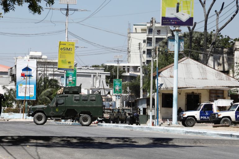 Vehicles of Somali security officers are parked near Syl Hotel, the scene of an al Qaeda-linked al Shabaab group's attack, in Mogadishu, Somalia