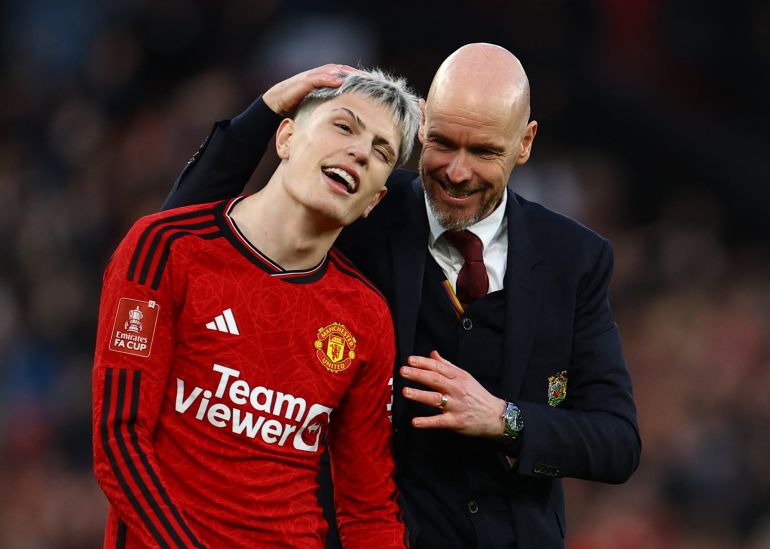 Soccer Football - FA Cup - Quarter Final - Manchester United v Liverpool - Old Trafford, Manchester, Britain - March 17, 2024 Manchester United manager Erik ten Hag and Alejandro Garnacho celebrate after the match REUTERS/Molly Darlington