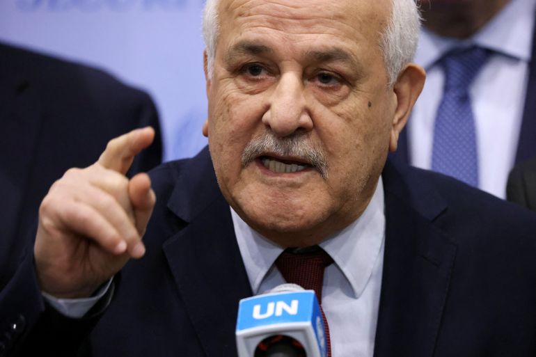 Palestinian Ambassador to the United Nations Riyad Mansour speaks with the media following a meeting of the Security Council to vote on a Gaza resolution that demands an immediate ceasefire for the month of Ramadan leading to a permanent sustainable ceasefire, and the immediate and unconditional release of all hostages, at U.N. headquarters in New York City, U.S., March 25, 2024. REUTERS/Andrew Kelly