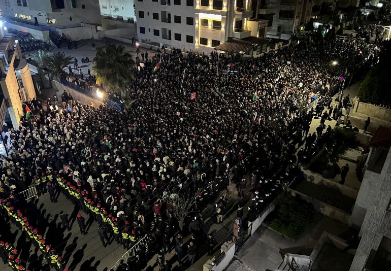 Demonstrators gather during a protest in support of Palestinians in Gaza, amid the ongoing conflict between Israel and the Palestinian Islamist group Hamas, outside Al Kalouti mosque near the Israeli embassy in Amman, Jordan March 27, 2024. REUTERS/Jehad Shelbak