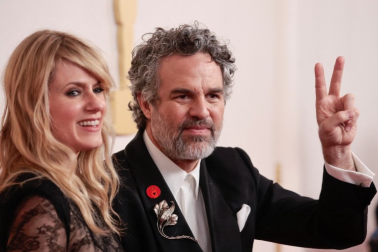 (From L)Sunrise Coigney and US actor Mark Ruffalo attend the 96th Annual Academy Awards at the Dolby Theatre in Hollywood, California on March 10