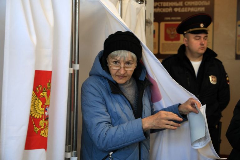 People cast their ballots in Simferopol, Crimea