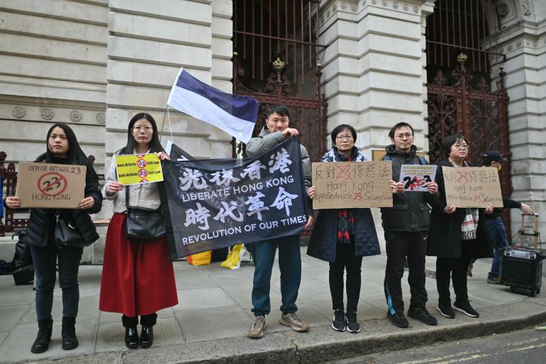 Protesters gather in front of the Foreign office in the UK to protest Article 23