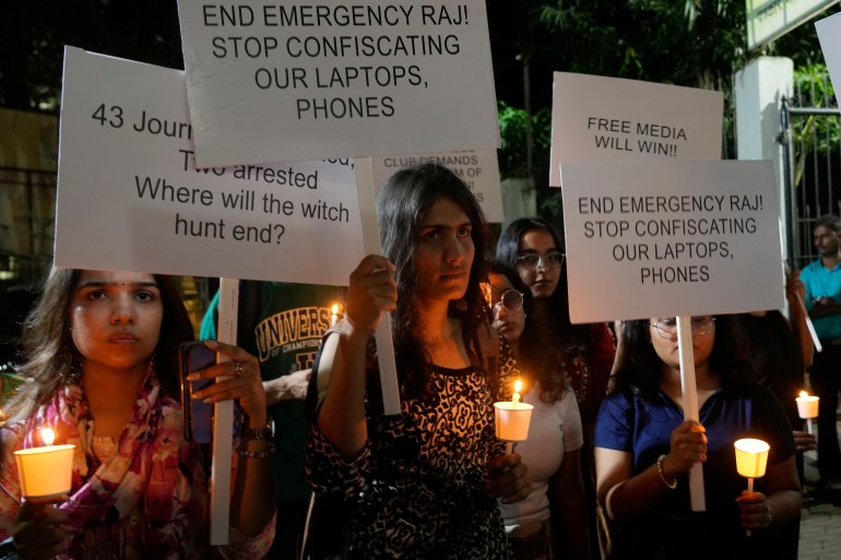 Members of the media hold placards during a protest against the recent detention of journalists, in Mumbai, India, Thursday, Oct. 5, 2023. Police in New Delhi have arrested the editor of NewsClick, a news website, and one of its administrators after raiding the homes of journalists working for the site, which has been critical of Prime Minister Narendra Modi and his Hindu nationalist-led government. (AP Photo/Rajanish Kakade)