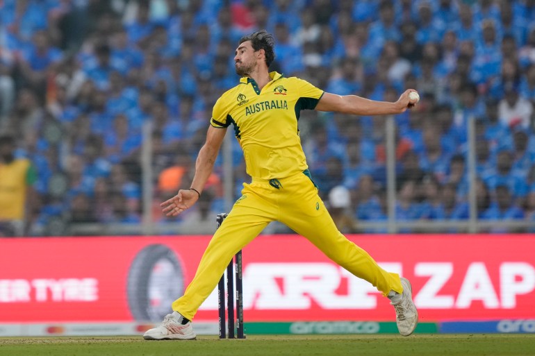 Australia's Mitchell Starc bowls a delivery during the ICC Men's Cricket World Cup final match between Australia and India in 2023.