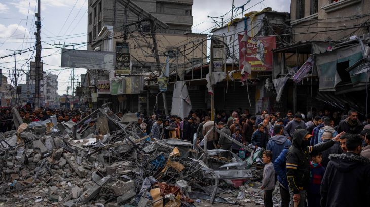 Palestinians check destruction after an Israeli strike on Rafah, Gaza Strip, Monday, March 4, 2024. [Fatima Shbair/AP]