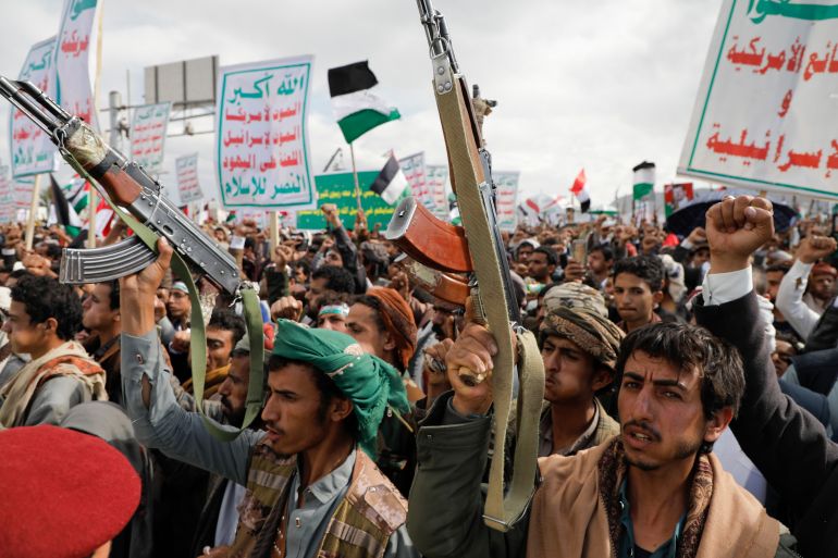 FILE - Houthi supporters attend a rally in the Gaza Strip, in Sanaa, Yemen, March 8, 2024. A major deadline under the half-century-old War Powers Resolution came this week for President Joe Biden to obtain Congress' approval to keep waging his military campaign against Yemen's Houthis. But it was met with public silence, even from Senate Democrats frustrated by the Biden administration's blowing past some of the checkpoints that would give Congress more of a say in the United States' deepening military engagement in the Middle East conflicts. (AP Photo/Osamah Abdulrahman, File)
