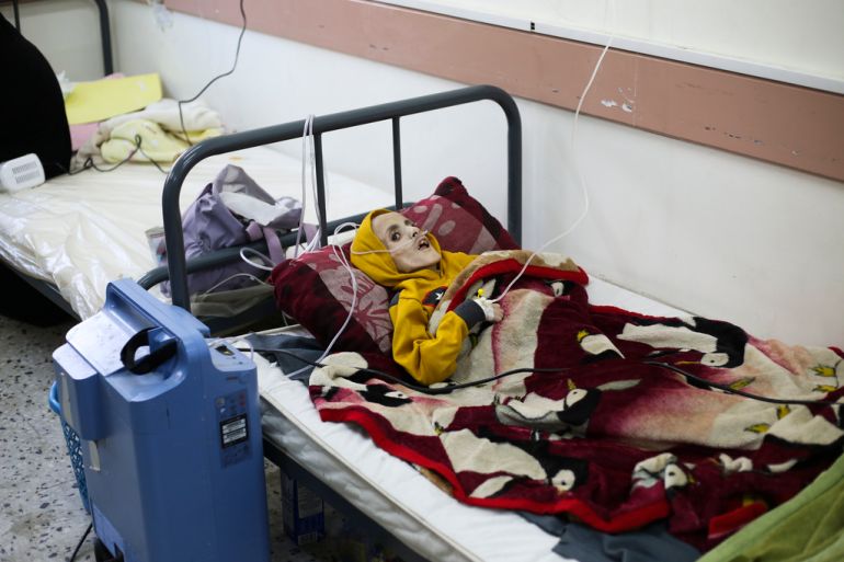 A 10-year-old Palestinian boy, Yazan al-Kafarna, who was born with cerebral palsy, lies at a hospital in Rafah, March 3, 2024